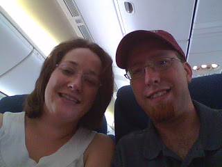 The two of us smiling as we had finally boarded the plane bound for Washington, DC.