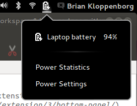 The battery icon in Gnome 3 is dark if you have previously used Unity